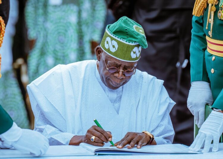 Tinubu signs